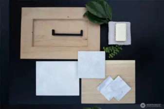 Primary Bathroom: White oak custom vanity with dual sinks, Heated floors, Regal Arabescato quartz bench, double glass french doors, dual custom closets