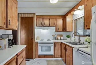 Kitchen with new dishwasher. Digitally staged.