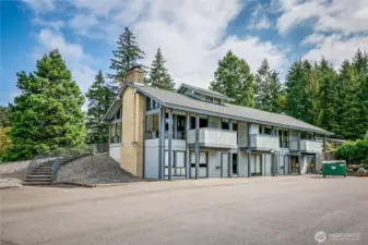 Community clubhouse with ample parking for guests.