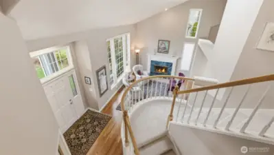 As you enter the home the vaulted ceilings and volume impress al that enter.  The hardwood floors gleam and the white wood finish work shine as you move around the home.