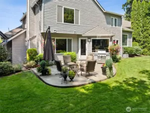 The backyard is partially fenced with a full sprinkler system and plenty of room to play and have fun.