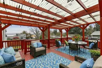 Spacious back deck with views of Dyes Inlet.