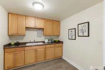 Partial kitchen: plumbed for fridge.
