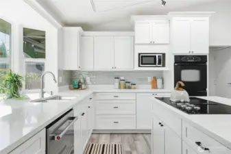 Quartz counters, shaker style soft close cabinets