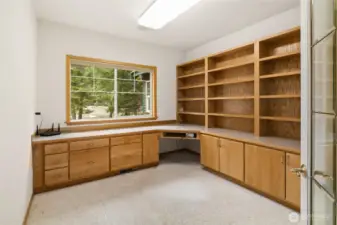 Home office with so much storage & lovely built ins!
