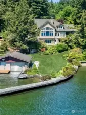 101 feet of waterfront with a boat house and private marina created from the jetty.