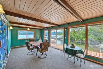 Entertain in the boathouse with a gorgeous dock leading to the boat lift.