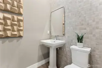 Main floor Half bath. Photos are for representational purposes only.  Colors and options may vary.