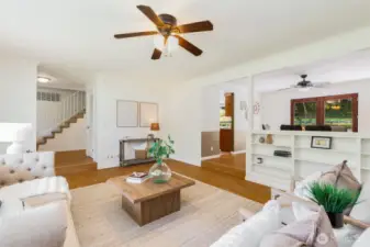 View from living room showcasing the main level circular floorplan, perfect for entertaining.