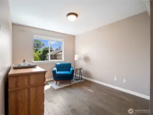 The third bedroom upstairs is flexible and awaits your personal touch.
