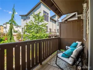 Step outside and enjoy your private balcony, offering a pleasant outdoor retreat and views of the surrounding community.