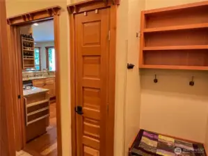 Utility area on the left of the doorway, behind me is the studio and garage access to the right.