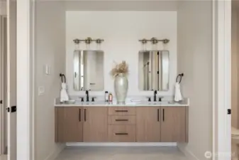 Double vanity with raised cabinets