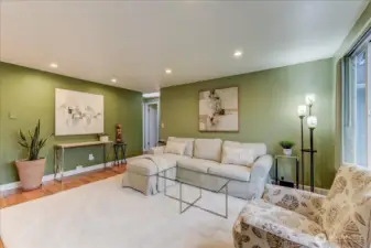 Welcome home to your primary living area that flows like a Great room with the dining and kitchen off to the left