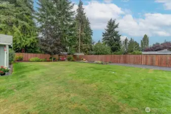 Fully Fenced Large back yard with garden area...you see pumpkins right now...zoom in