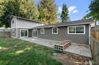 Flat yard with patio.