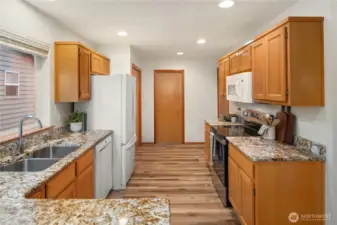 Kitchen looking towards back entry/laundry room.