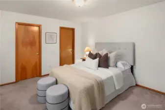 Primary features roomy walk-in closet and ensuite bath.