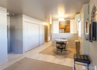 The laundry is just off the dining room in a closet so hidden from view.