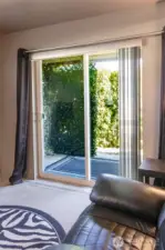 The living room opens up to your own private patio!