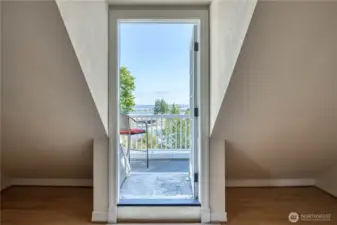 Upstairs level 2 bonus room access to East facing outdoor deck. Perfect for morning coffee or reading a book!