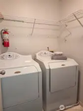 The laundry room is located upstairs in close proximity to all three bedrooms for convenience.