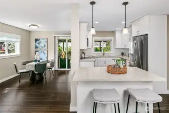 Kitchen is open and has a nice island. Dining room has access to a covered porch. All remodeled in 2018.
