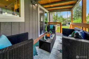 Covered deck is a lovely place to spend time.