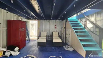 Remodeled in 2024 w all new staircase, loft structure, flooring, dock edge bumpers, new curtain and opener