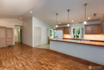 Open Kitchen to living and dining area. Vaulted ceilings.