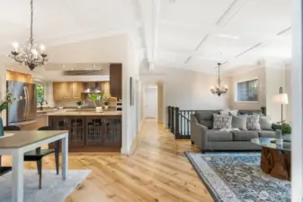 Light-filled spaces fill the open floor plan.  Newly refinished knotty pine and oak floors.