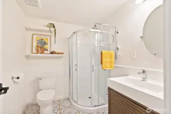 Updated three-quarter bathroom on lower level.