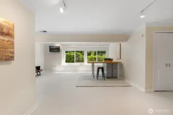 Large rec-room/flex space for all your hobbies!  Includes a cedar-lined closet and plenty of storage.