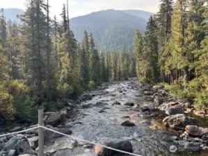 The view of the river from the bridge.