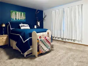 Primary Suite with Full bathroom, walk-in closet views to the back of the property