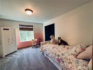 First bedroom, wall to wall carpet, views of the fruit trees