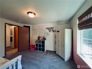 First bedroom, wall to wall carpet, views of the fruit trees