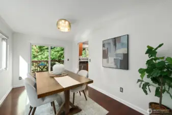 Great space for an intimate meal or a group with sliders to the back deck.