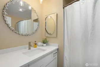 Full remodeled bath serves the two smaller bedrooms.