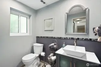 Nicely remodeled 3/4 bath serves the downstairs area.