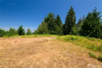 This serene homesite offers more than just a place to build—it provides a quiet retreat surrounded by nature. Water and gas are in the street and electricity is already on the property.