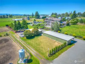 A view of the property's paddocks, a field and the surrounding venue areas