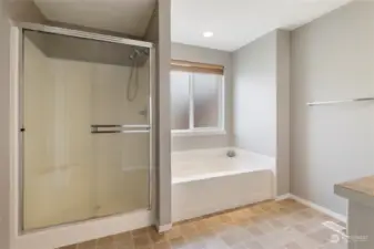 Primary Bathroom with Step-In Shower & Soaking