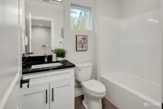 Third floor bathroom with full bathtub