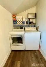Laundry room off pantry and kitchen