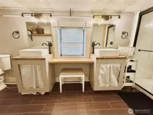 Primary Bathroom with double sinks and vanity