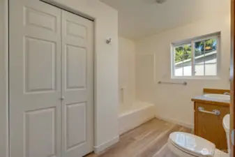 En-suite primary bath, new flooring & toilet