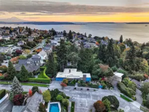 Commanding its corner parcel just above the bluff, 4221 W Armour sits quietly within one of Magnolia’s most coveted enclaves. With Olympic sunsets to the west, Mount Rainier rising in the southeast, and the shimmering curve of Puget Sound below, this home belongs not only to its lot—but to the vast, layered story of the Pacific Northwest.
