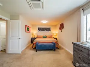 GOOD SIZED SPACE HERE IN THE PRIMARY...THAT'S A KING BED WITH GOOD SIZED NIGHTSTANDS ON EITHER SIDE