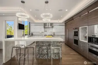 Huge island with lot's seating with beautiful Quartzite and Granite countertops.